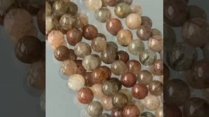 Кварц с включениями рутила, актинолита, гематита и др. минералов, шары