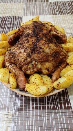 Цыпленок с маслом и чесноком.