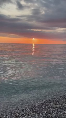 Летний июльский закат с берега Чёрного моря из Абхазии