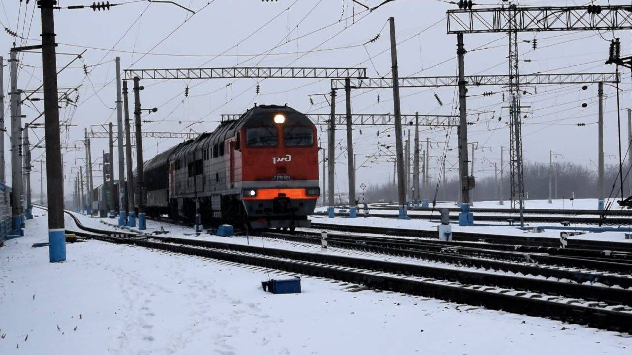 Тепловоз 2ТЭ116У-0202 и ТГК2-1-9164 на платформе.