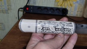 Саамский нож в художественном оформлении....