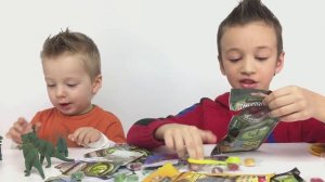 Боевые Динозавры Распаковка игрушек Игры с Динозаврами. Видео для детей