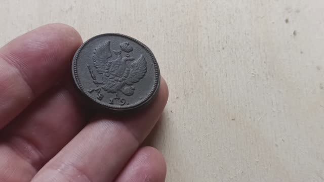 Что означают на старинной монете буквы АД