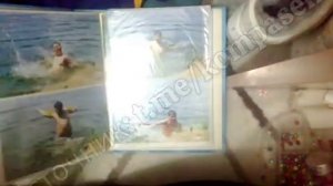 KomputerSemНовалон просматривает старые семейные фотографии [get-save.com]