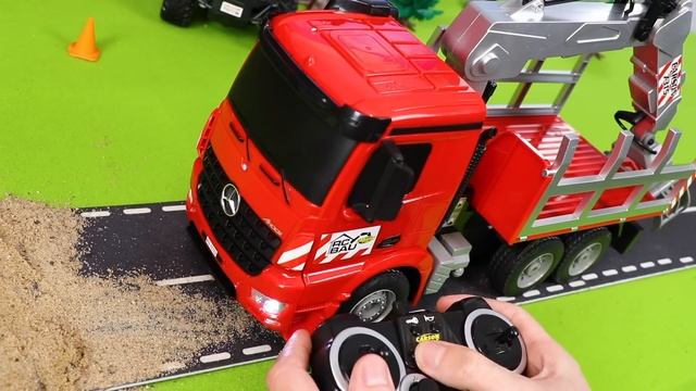 Эвакуатор экскаватор и различные строительные игрушки на миссии по спасению моста