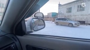 Постановка транспортного средства на место стоянки при движение задним ходом с поворотом на 90 граду