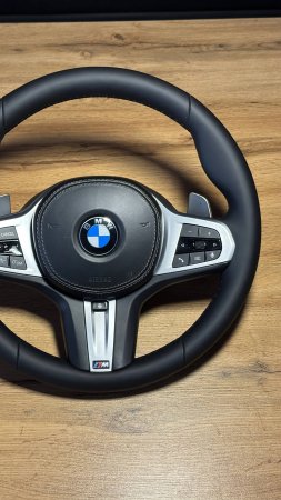 Перешили руль от BMW X7 с использованием натуральной кожи