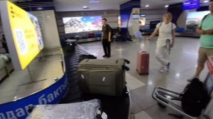 Прилетела в Бишкек в Кыргызстан в Манас в аэропорт,забираю багаж