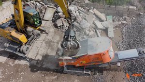 Arjes Impaktor EVO II в действии. Дробление строительных отходов.