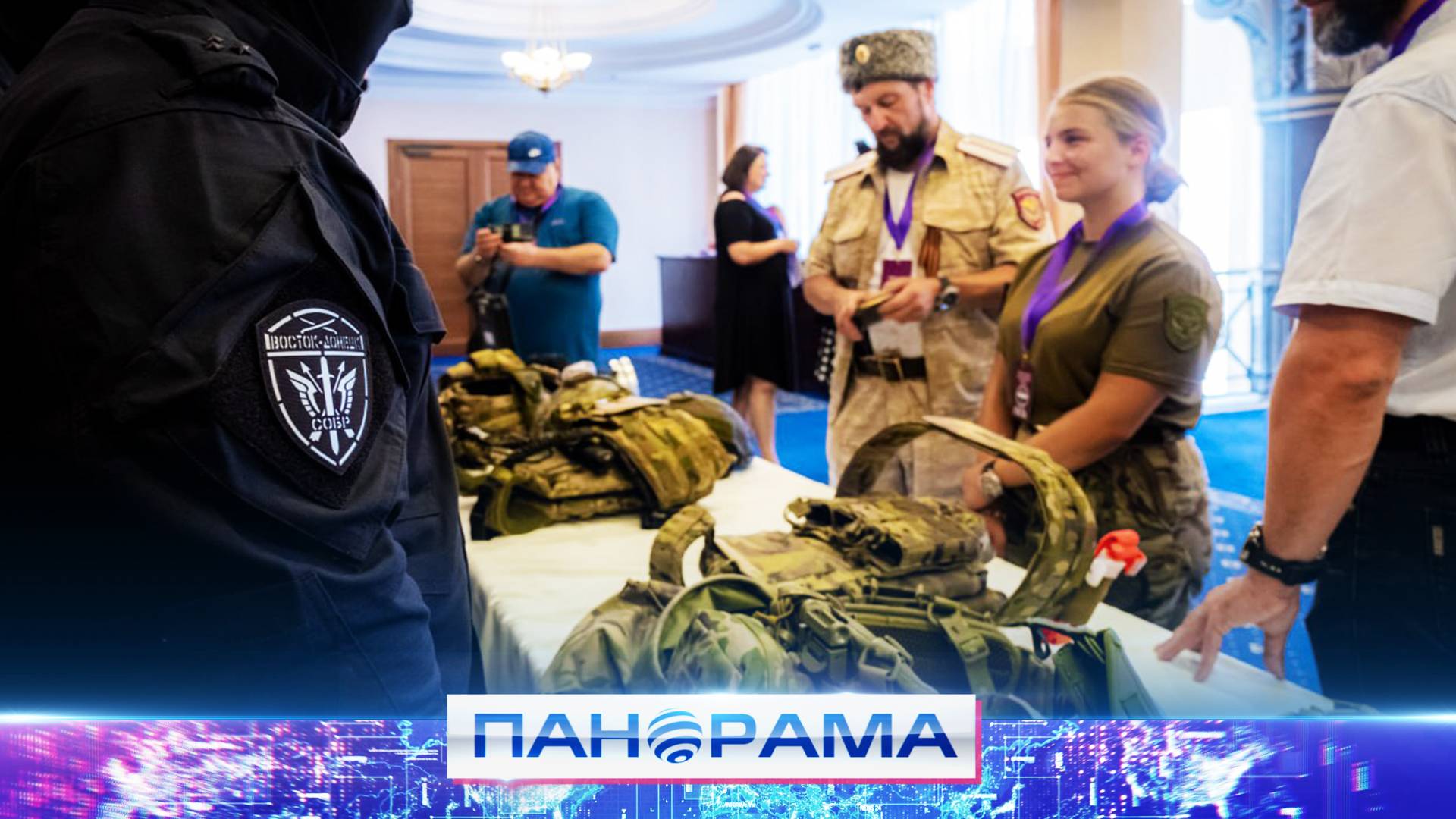 Закулисье службы в Росгвардии: на I казачьем форуме молодёжь примеряла экипировку силовиков