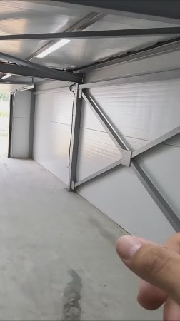 Гараж из сэндвич-панелей с примыканием к дому 11х4.4 Часть 10.