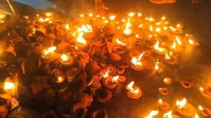 Look at how everyone is clapping and offering lamps to Lord Damodar in Mayapur Chandrodaya Mandir