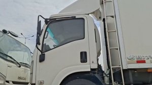 Получение партии грузовиков Isuzu