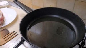 Свиная отбивная на сковороде