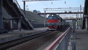 Тепловоз 2ТЭ116У-0070 с контейнерным поездом.