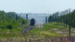 2ТЭ10УТ-0064 секция А с пассажирским поездом Киев - Херсон следует через разъезд Новодмитриевский