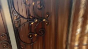 Забор из евроштакетника и кованные ворота в Донецке.