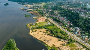 Застройка берега реки Волги вдоль набережной Гребного канала. Проекты ГК "GloraX" и "Level Group"