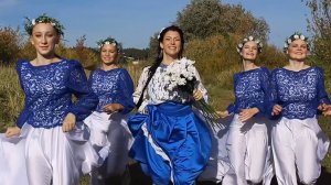 Песня в русско-народном стиле «Июнь ромашками»; поёт Зоя Воловикова; танцует ансамбль «Загадка»