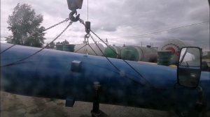 Разгрузка газгольдеров, переворот в воздухе. работа двумя гаками одновременно.