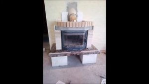 Облицовка кирпичного камина мрамором.