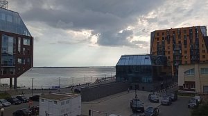 Архангельск -Вид из гостиницы на набережную Северной Двины, храм Михаила Архангела и грозовой фронт