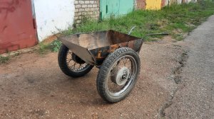 Садовая тачка из колёс ИЖА и 100 литровой бочки.