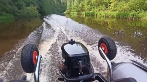 По реке Охта, вдоль Муринской дороги.