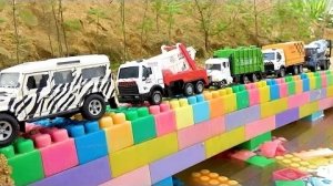 Мультики для малышей грузовики переезжают мост