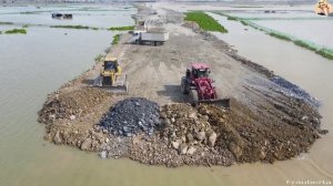 Строительство, дорога через озеро, другой обзор