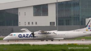 Турбовинтовой Бомбардье авиакомпании Qazaq Air на рулении перед вылетом в аэропорту Алматы.