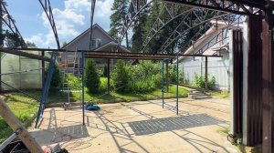 Большой навес для автомобилей с кровлей из профлиста, откатные ворота, калитка и новая линия забора