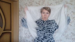 Белые пуховые палантины в ассортименте.