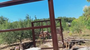 Сварил распашные ворота и установил их . Прикрутил и приварил засовы и ушки и покрасил их два раза