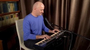 Поющий пианист