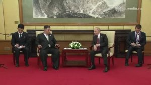 Путин и Ким Чен Ын на встрече в Пекине