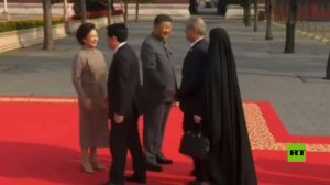 الرئيس الإيراني يتجنب مصافحة سيدة الصين الأولى