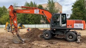 Парк 50-летия Октября. Экскаватор Hitachi ZX210W-3. СТ-Партс. #parts70