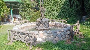 оформление водоёма на  даче мастер Rafferty.