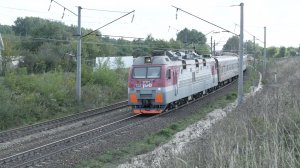 Электровоз ЭП1М-722 с пассажирским поездом №348Й Уфа - Санкт-Петербург проходит пл. Сартаково