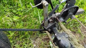 Про натяжитель ремня роторной косилки.