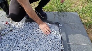 Изготовление памятника засыпка цветника камушками на