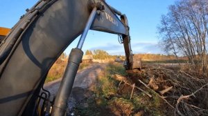 Планировка участка под свайное поле на экскаваторе В