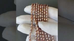 Жемчуг речной розовый мелкий рис 5А 4,8-5,3х3,3-3,7 мм гладкий