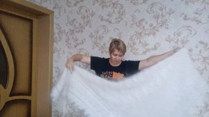 Большие и теплые белые пуховые платки.