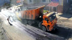 Укладка асфальта на участке дороги на Владимирской улице в городе Вязники. Съемка 13.09.2025