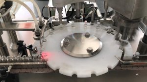 производственная линия наполнения и укупорки флаконов,моноблок