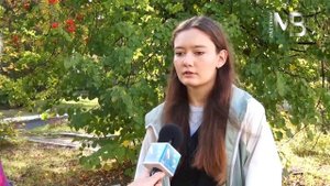 С рюкзаком за спиной