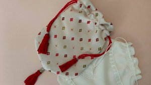 Сумочка-мешочек "Ромбики" с кисточками