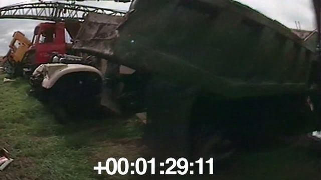 Автомашины перед захоронением на Буряковке.